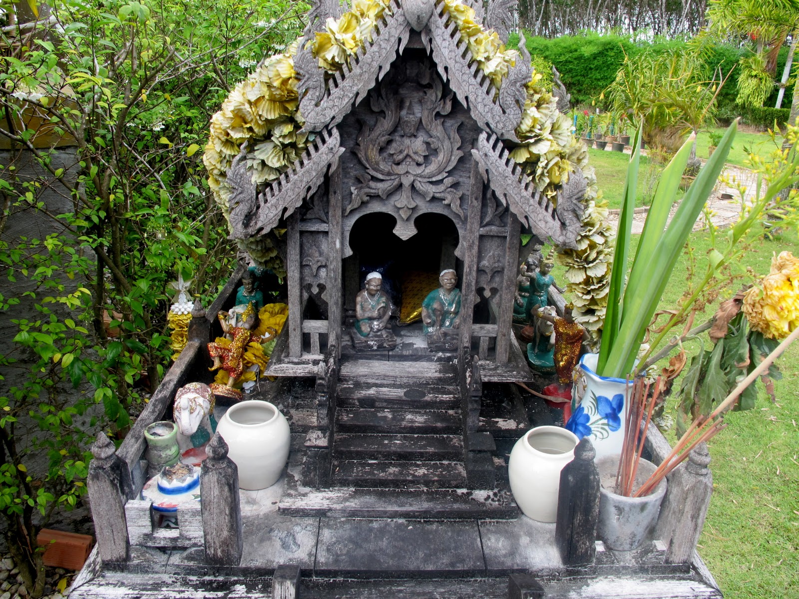 The Loaded Trunk Spirit Houses
