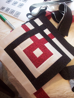 Black, White and Red Fabric made into a Quilt Block