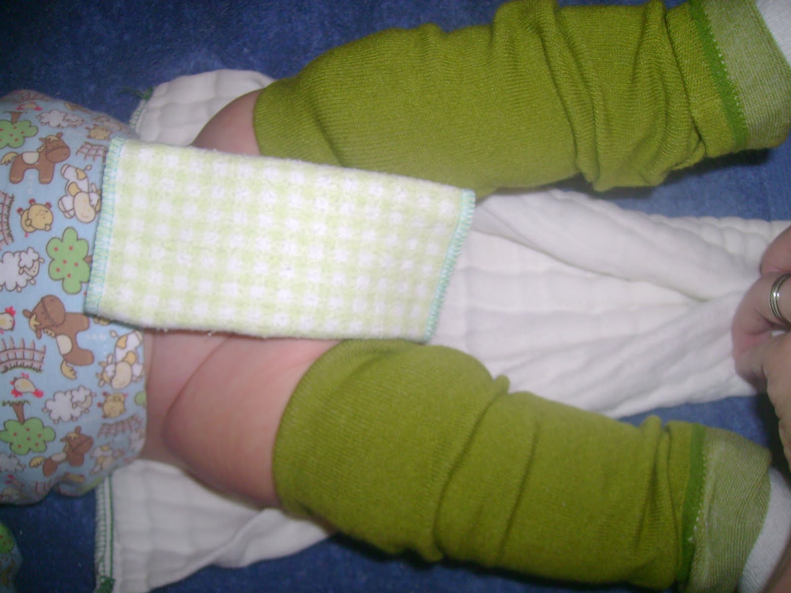 Leaving Little Footprints Folding a prefold diaper Jelly Roll Fold