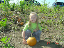 Picking her pumpkin