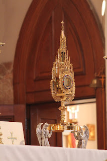 The Monstrance containing the Blessed Sacrament.
