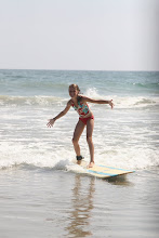 Me surfing at the Beach!!