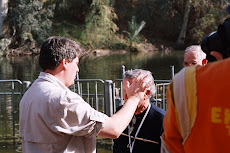 Fred renewing the baptism of Bob Sturtz in the Jordan