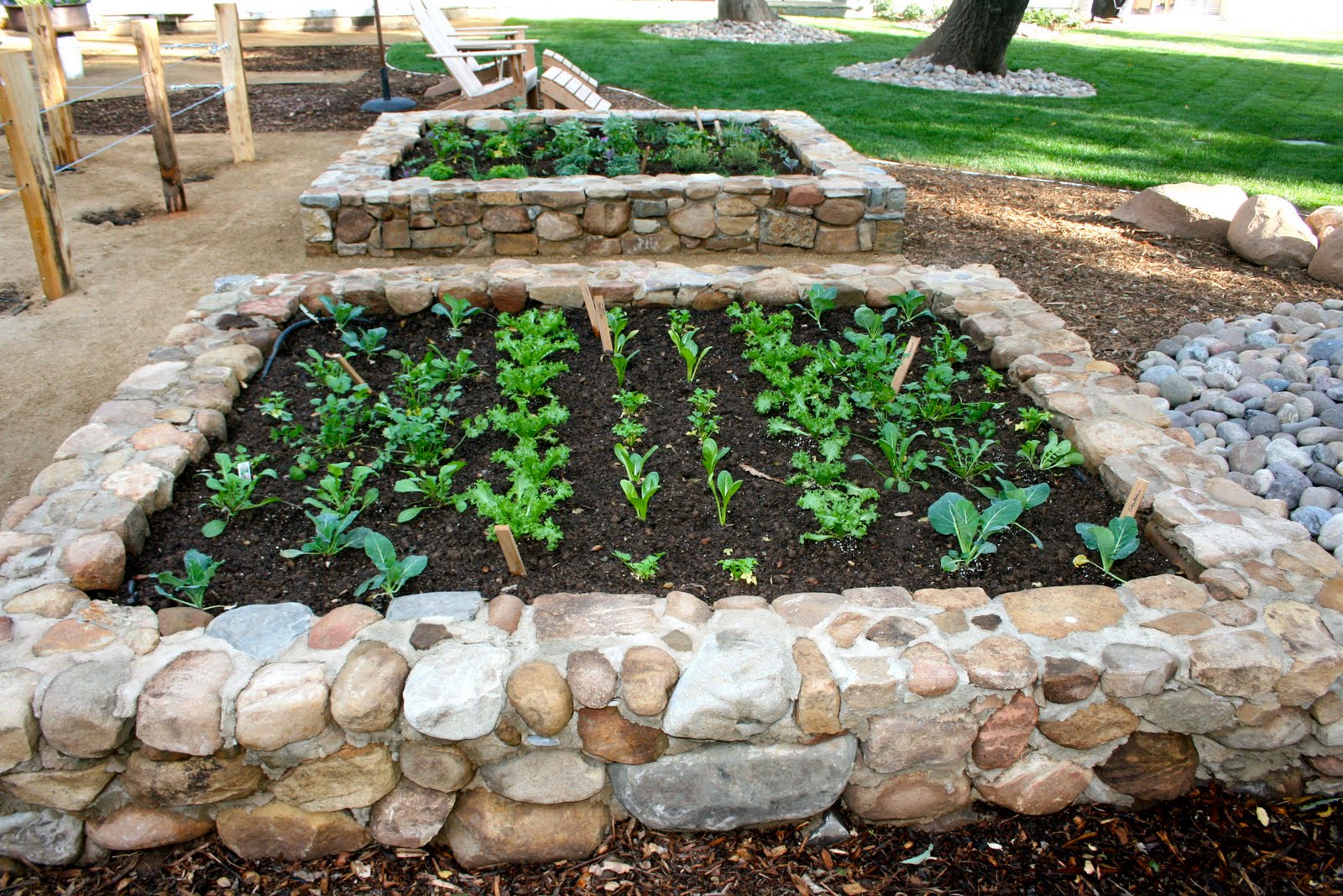 The Polished Pebble: Ojai Country House: Garden Design rock raised garden bed ideas