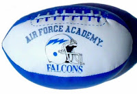 Air Force Academy Falcons football helmet with lightning bolt on toy stuffed football.