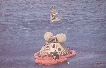 The Command Module Odyssey of the Apollo 13 space mission floats in the Pacific Ocean near Samoa after splashdown on April 17, 1970. (AP Photo)