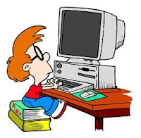 little boy working at a computer