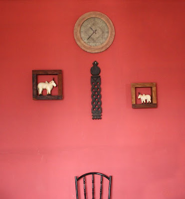 A red wall in the living room