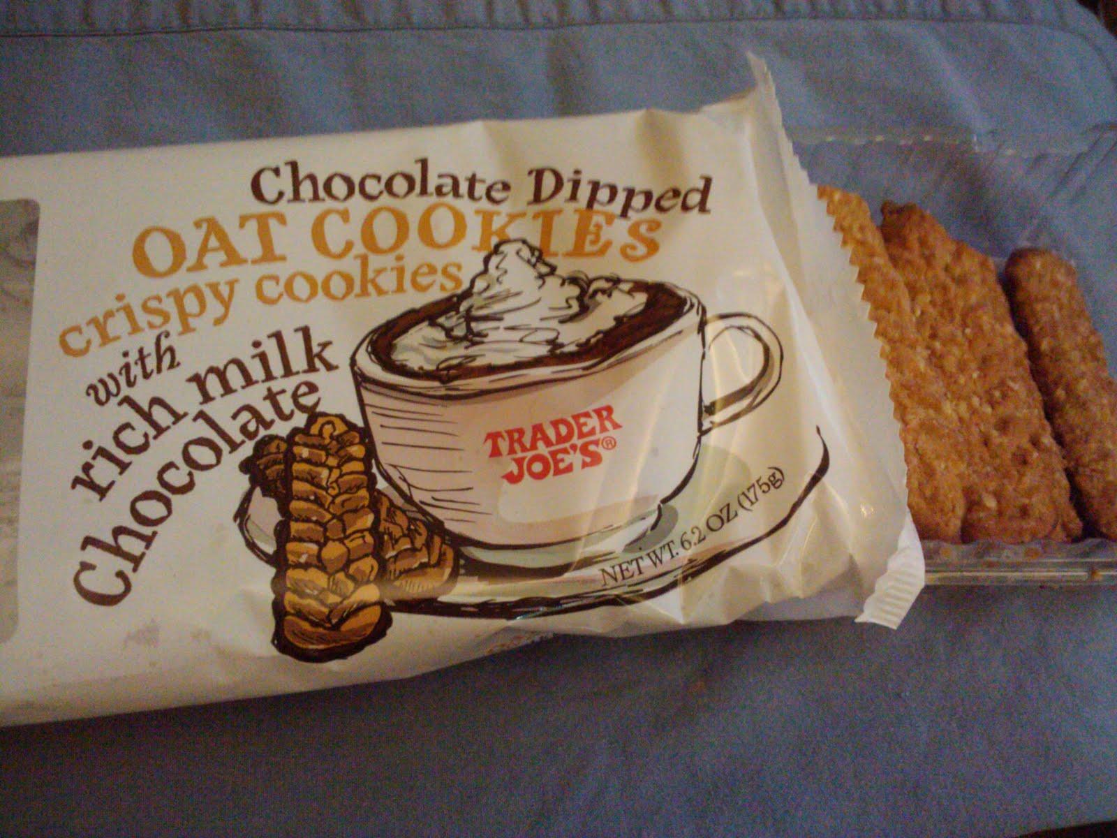 these are good. buy some. trader joe's chocolate dipped oat cookies crispy cookies with rich milk chocolate
