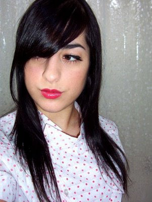 Emo hairstyles generally have bangs. The colour of the hair is usually dark