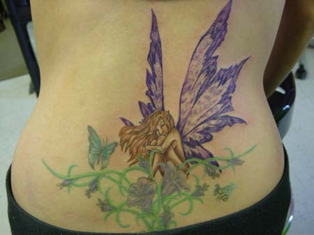 lower back tattoo images. woman low back tattoos