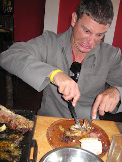 Chad enjoying his meat at a Parrilla.