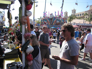 Chad ordering an ear of corn at the San Diego County Fair