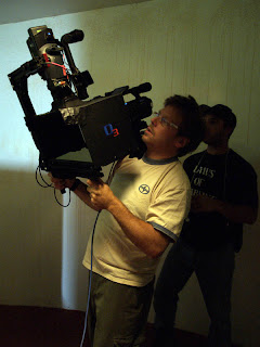 Twin-HDV camera rig for hand-held shooting