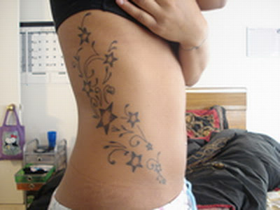 star tattoos side body