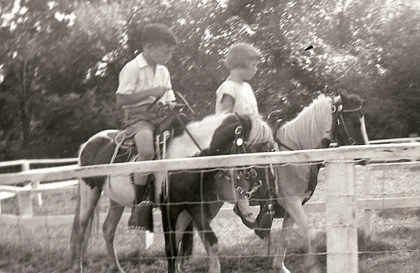 Johnny & Betty practice their horsemanship.