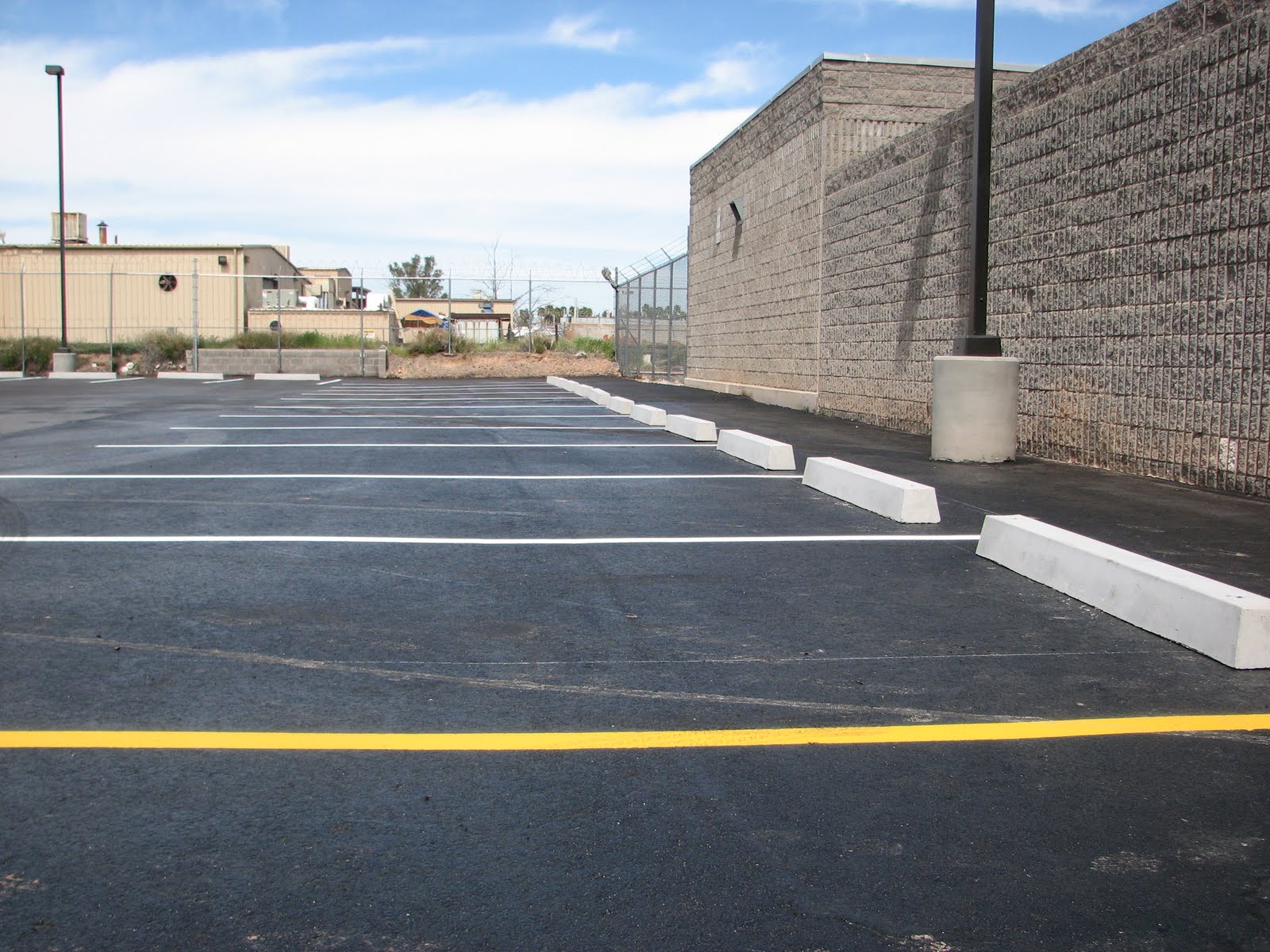 Moyers Contracting, Inc. "Parking Lot Maintenance": Precast Bumper Curb