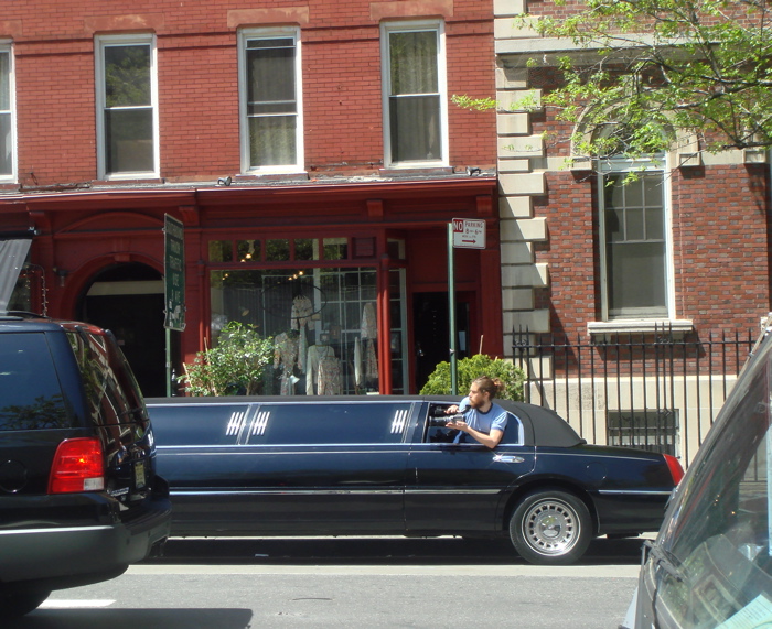 [Man+shooting+film+from+Limo.jpg]