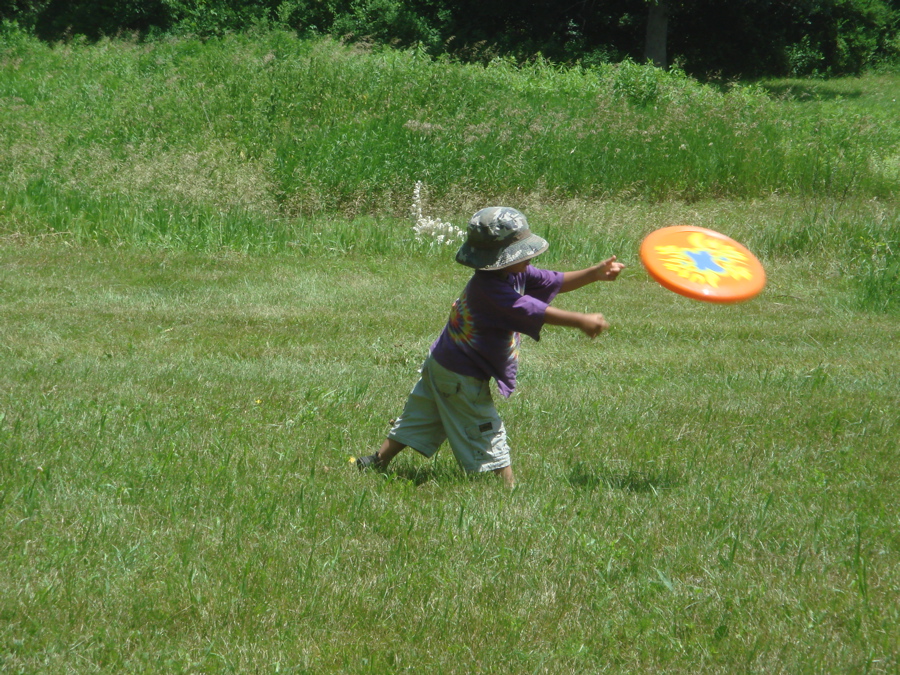 [Devon+throwing+large+frizbe.jpg]