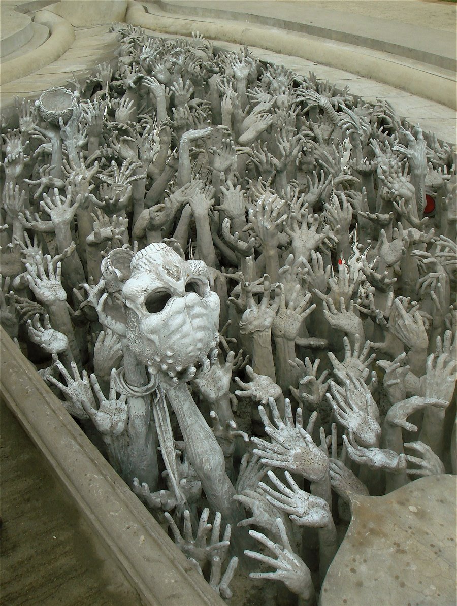 [hands+and+skull+reaching+out+from+hell.jpg]