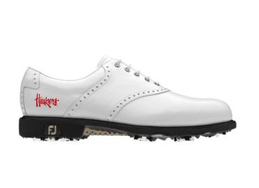 U of Nebraska golf she that is white with red Huskers word written on the back near the arch support on this lady's size 8 FJ product.