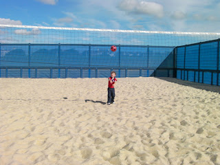 sandy floored beach volleyball court