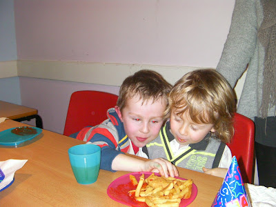 stealing chips at birthday party in soft play kids area