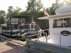 YA's swim platform tucked under LEGRACE's dinghy.