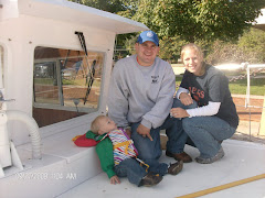 Poor Parker stuffed into the life jacket--with Bob and Sarah on YA