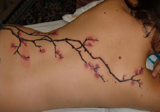 flower tattoo in sexy girl back body