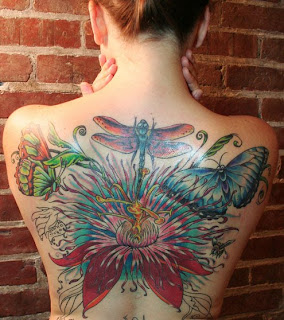  designed flower tattoo butterfly on the back of a girl