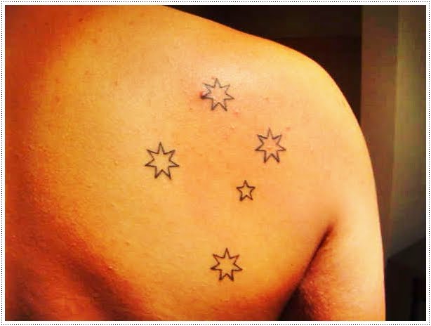 At this point Oprah shows photos of the matching southern cross tattoos that 