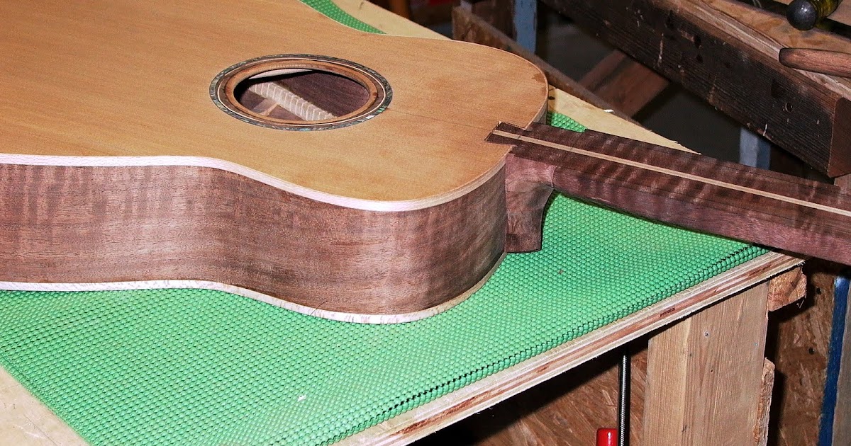 ThreeQuartersLeft Fitting the neck onto an acoustic guitar