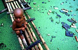 [Child_green_water_Dhaka+slums.jpg]