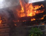 [edificio_em_chamas_1240424036.jpg]