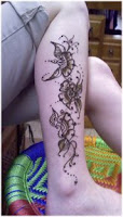 floral henna tattoo for the leg