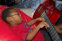 The Musician and His Red Guitar