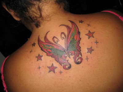 butterfly tattoo on upper back