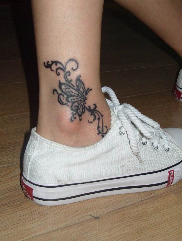 black and white butterfly tattoos. tattoos designs for women on