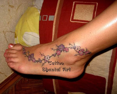 flower tattoos on the foot