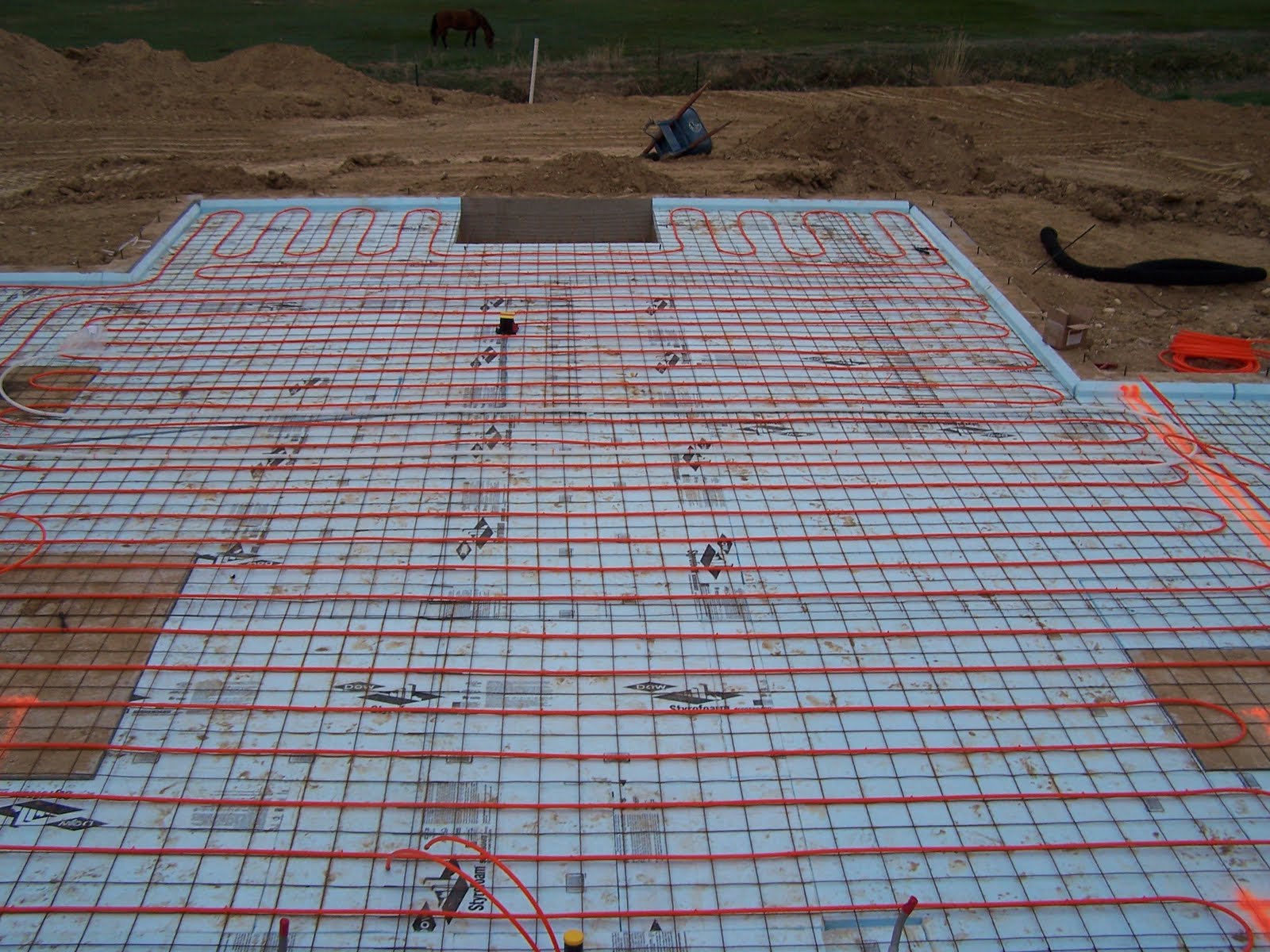 Home Construction Underslab insulation, radiant heat, and rain!
