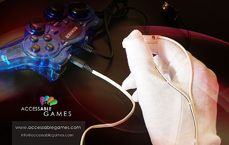Image of a switch adapted translucent blue joypad, next to a white gloved hand, that has a wire, and tow contacts stitched into the thumb and forefinger area. Text reads, Access Able Games.