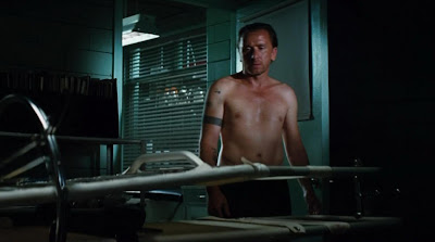 Tim Roth is a shirtless bad guy...