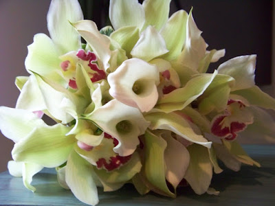 centerpieces The brides bouquet consisted of only miniature calla lilies