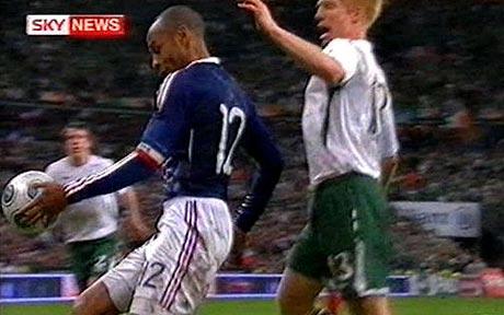 A Ball floated in and drops in the six yard box Thierry Henry plucks the 