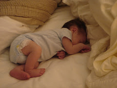 Snoozing in Moms bed...