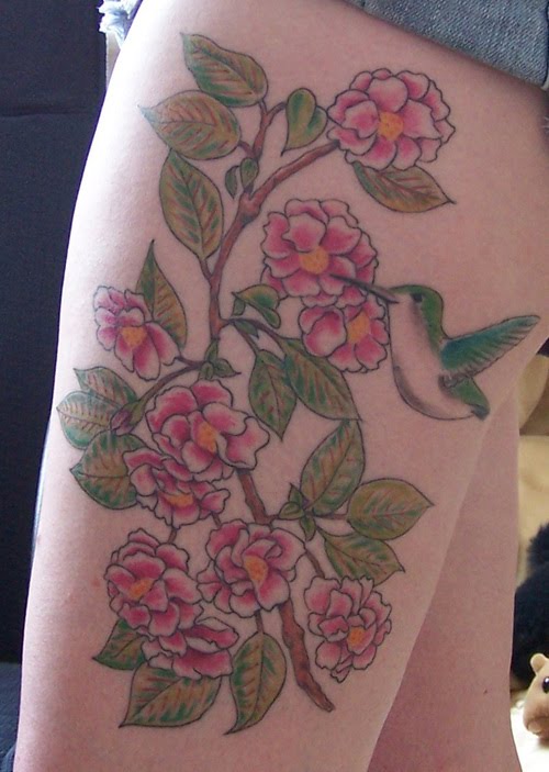 humming bird tattoo. And Hummingbird Tattoo