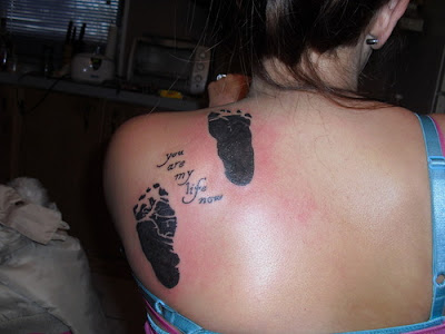 baby footprint tattoos. aby footprint tattoos