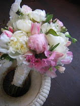 Spring bridal bouquet of sweet peas and peonies
