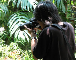 Photographer at Phuket Butterfly Garden